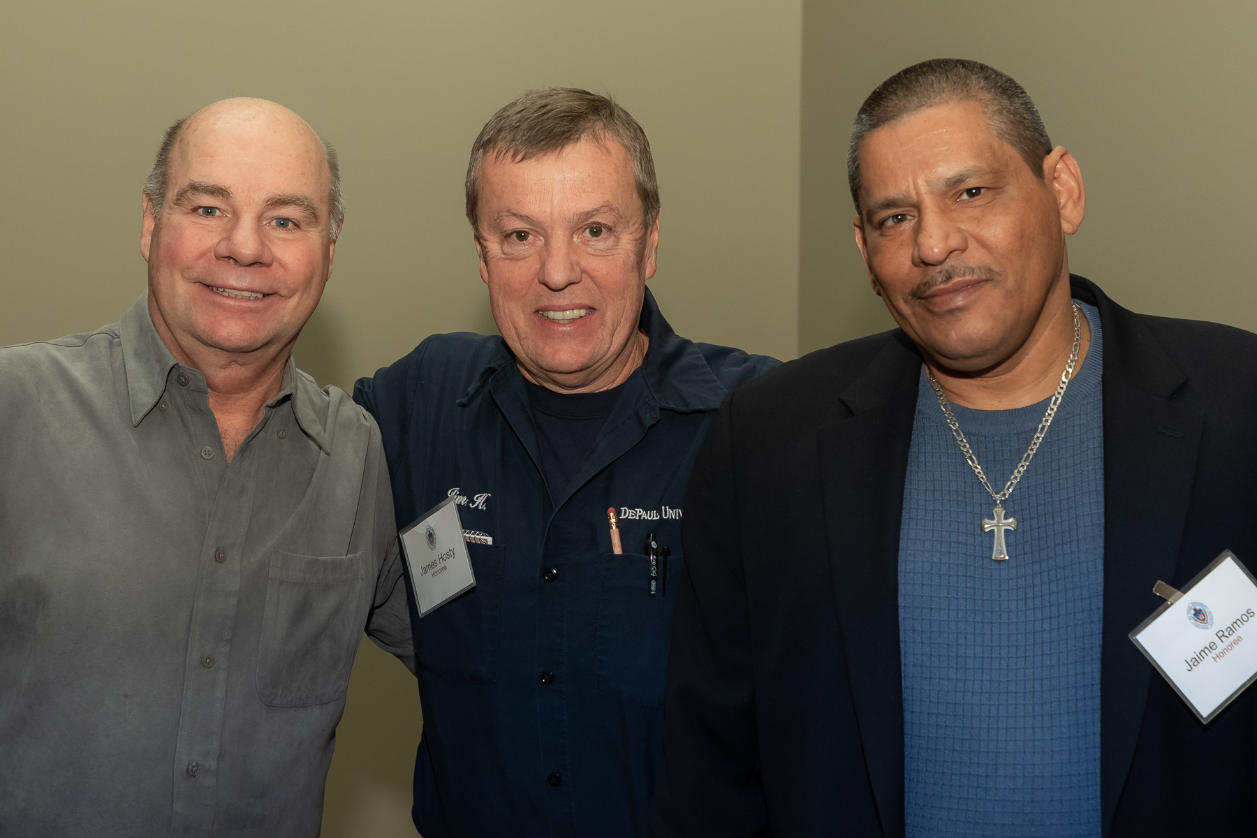 Left to right, Walter Rabenda, James Hosty, and Jaime Ramos, staff in Facility Operations, as DePaul University faculty and staff members are honored for their 25 years of service during a luncheon, Tuesday, Nov. 13, 2018, at the Lincoln Park Student Center. The honorees were recognized by A. Gabriel Esteban, Ph.D., president of DePaul, and will have their names added to plaques located on the Loop and Lincoln Park Campuses. (DePaul University/Jeff Carrion)